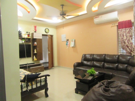 4) 2 Bhk Flat for Sale in Tirupati - Hall With Wood Room.JPG